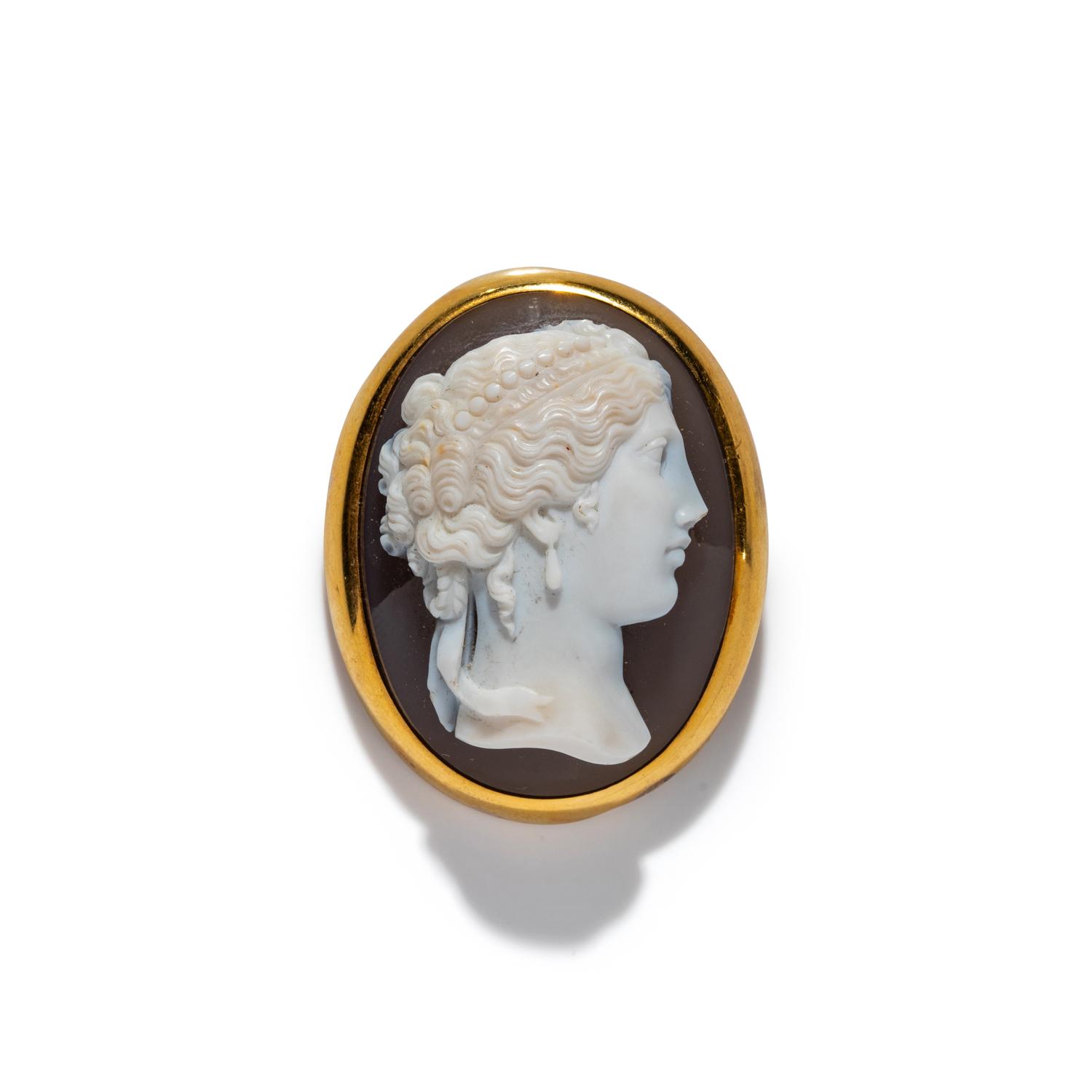 A Neoclassical Gold and Sardonyx Cameo Brooch with a Portrait Head of a Goddess