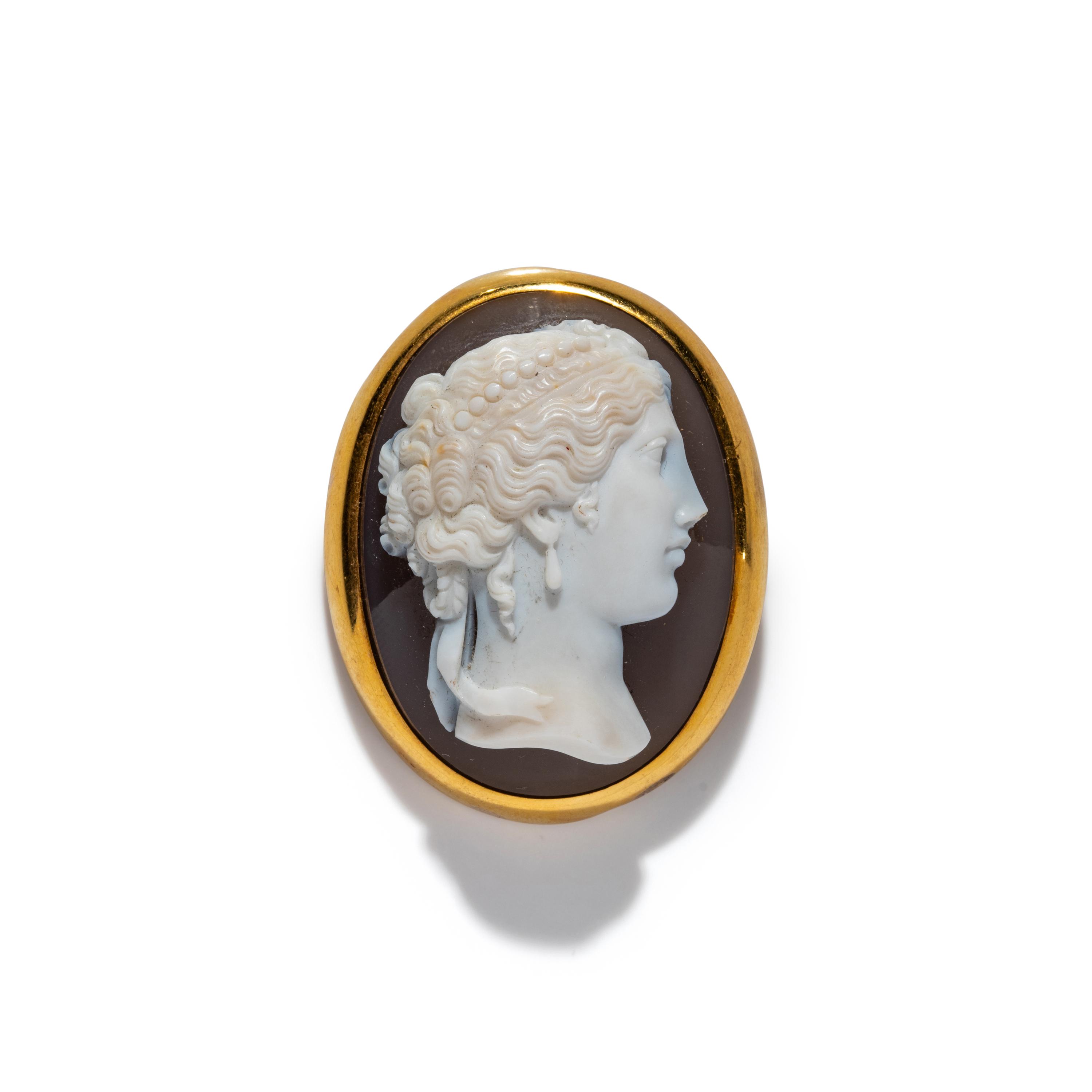 A Neoclassical Gold and Sardonyx Cameo Brooch with a Portrait Head of a Goddess