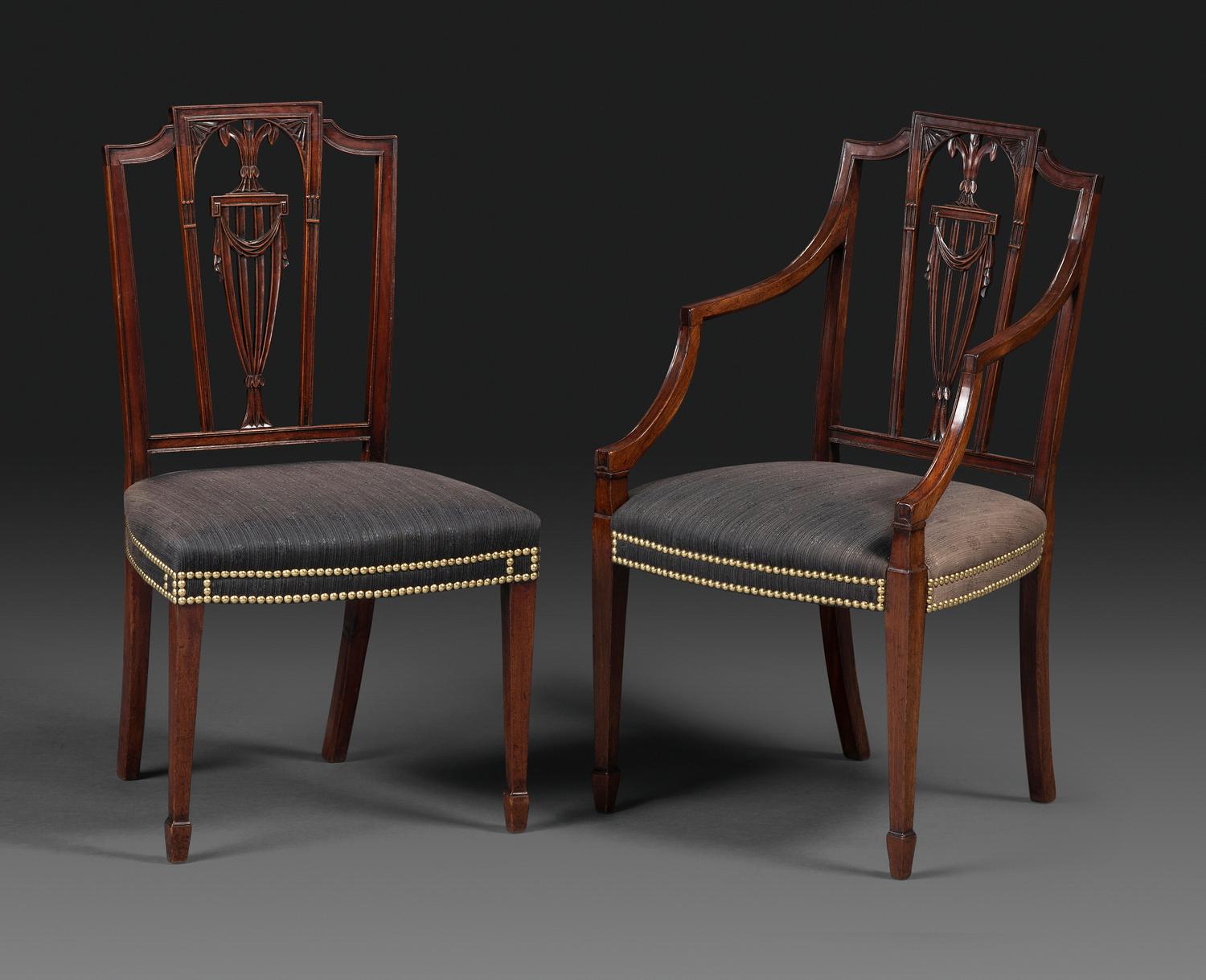 A Set of Eight Federal Carved Mahogany Dining Chairs