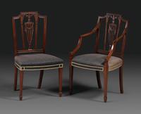 A Set of Eight Federal Carved Mahogany Dining Chairs
