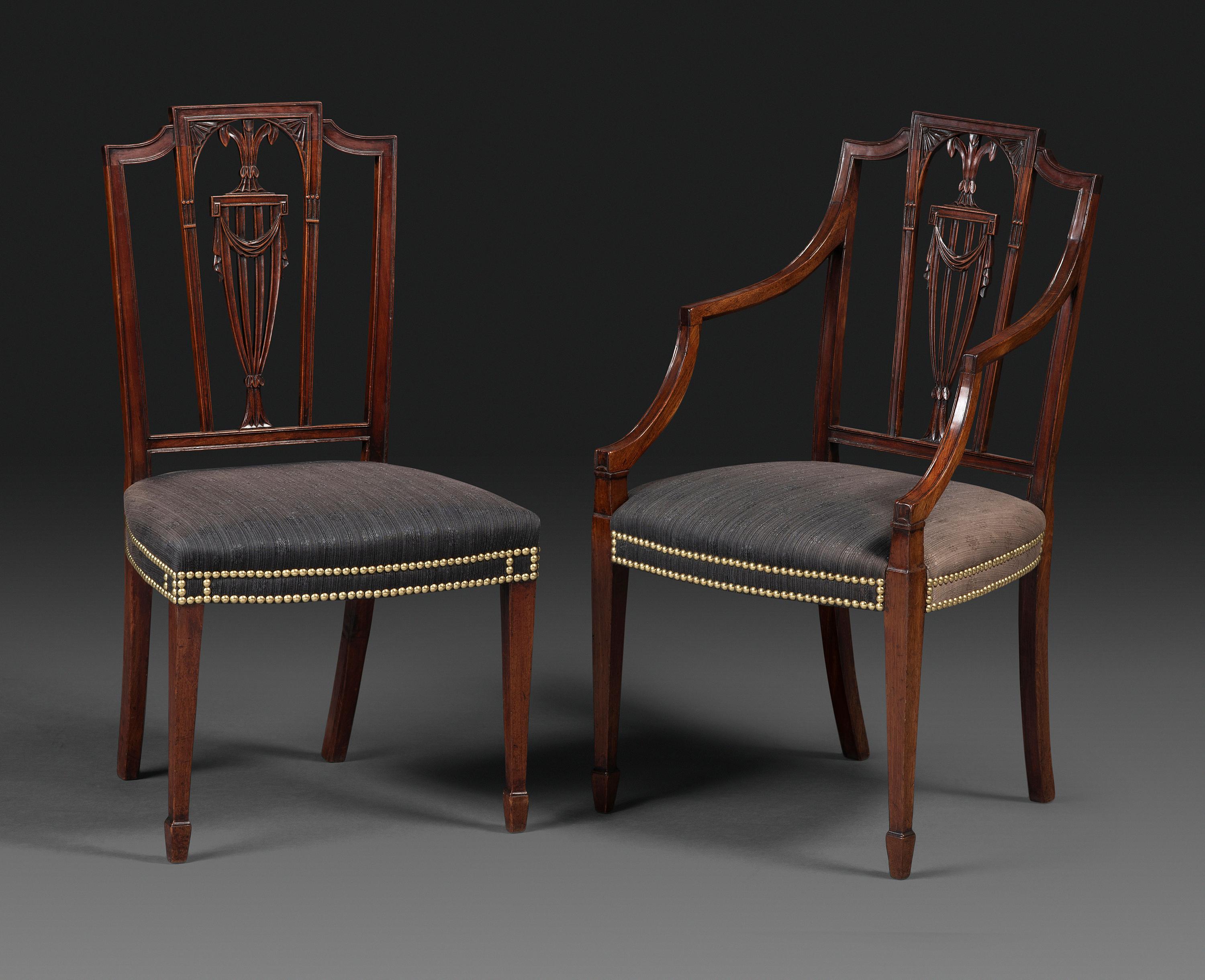 A Set of Eight Federal Carved Mahogany Dining Chairs