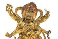 A Sino-Tibetan Gilt Bronze Figure of Mahakala