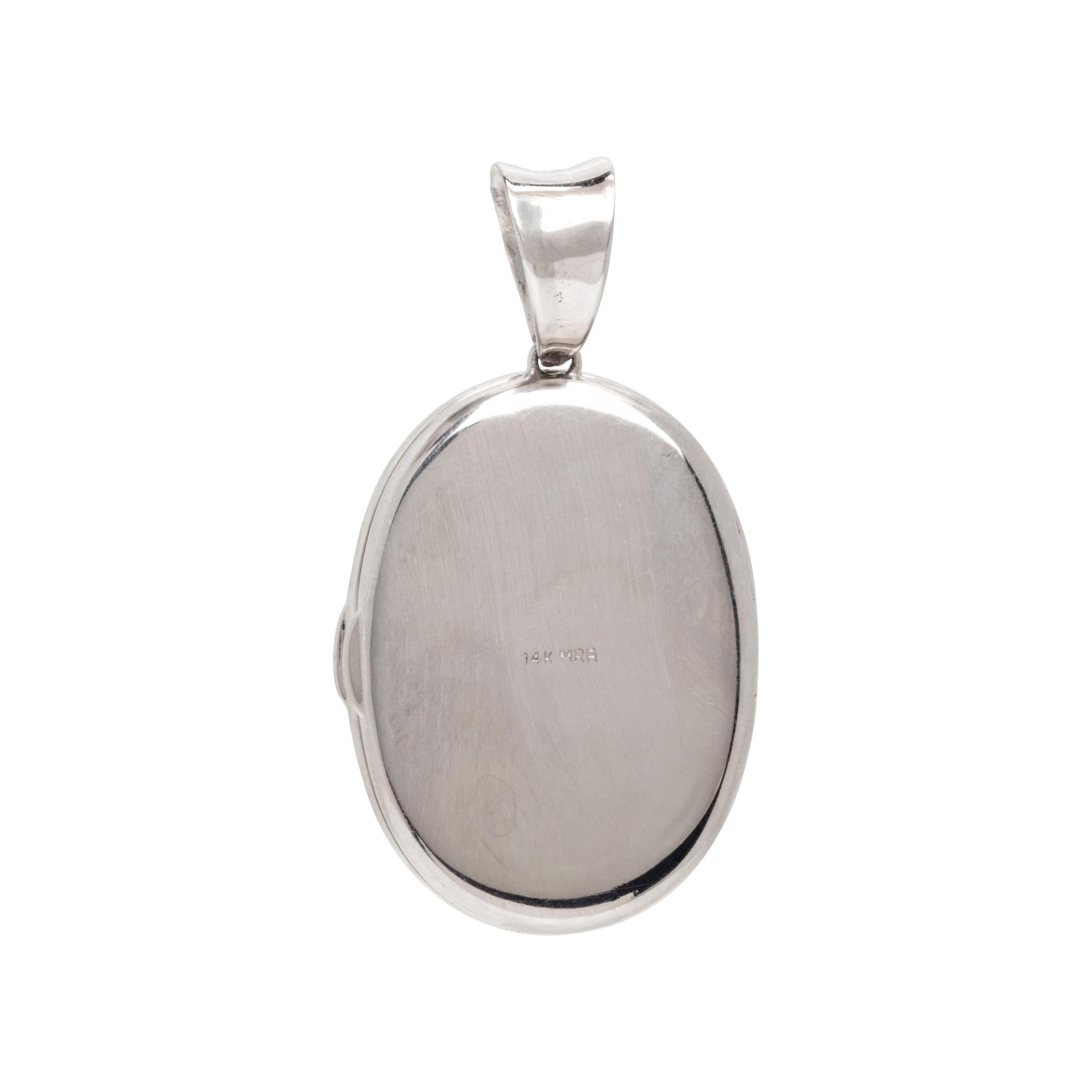 DIAMOND AND WHITE GOLD LOCKET AND EARRINGS
