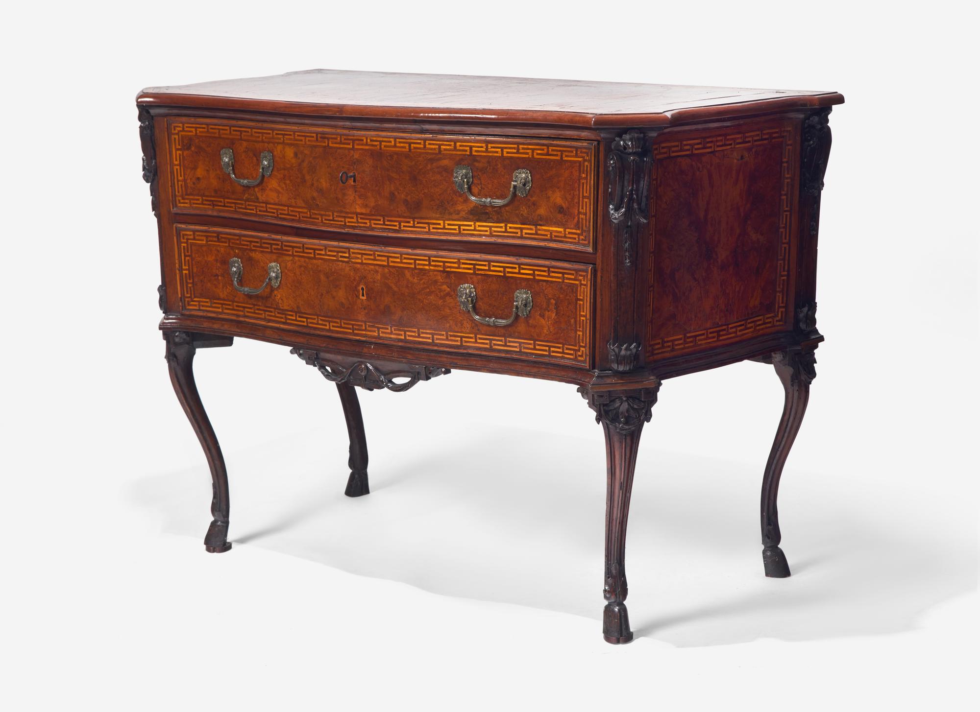 A Rococo Burr Walnut and Fruitwood Commode