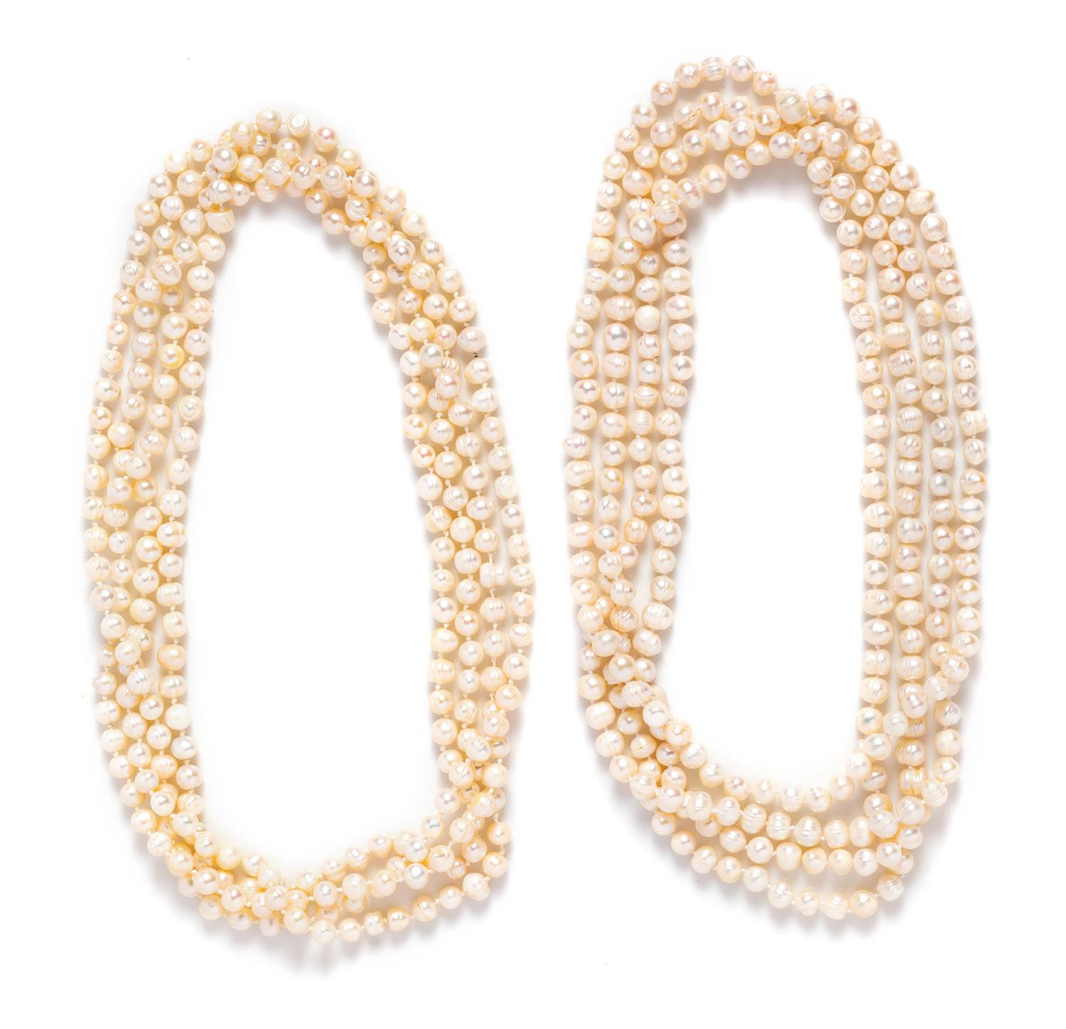 A Pair of Cultured Baroque Pearl Long Strand Necklaces,