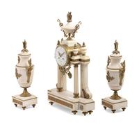 A French Gilt Metal Mounted Marble Three-Piece Clock Garniture