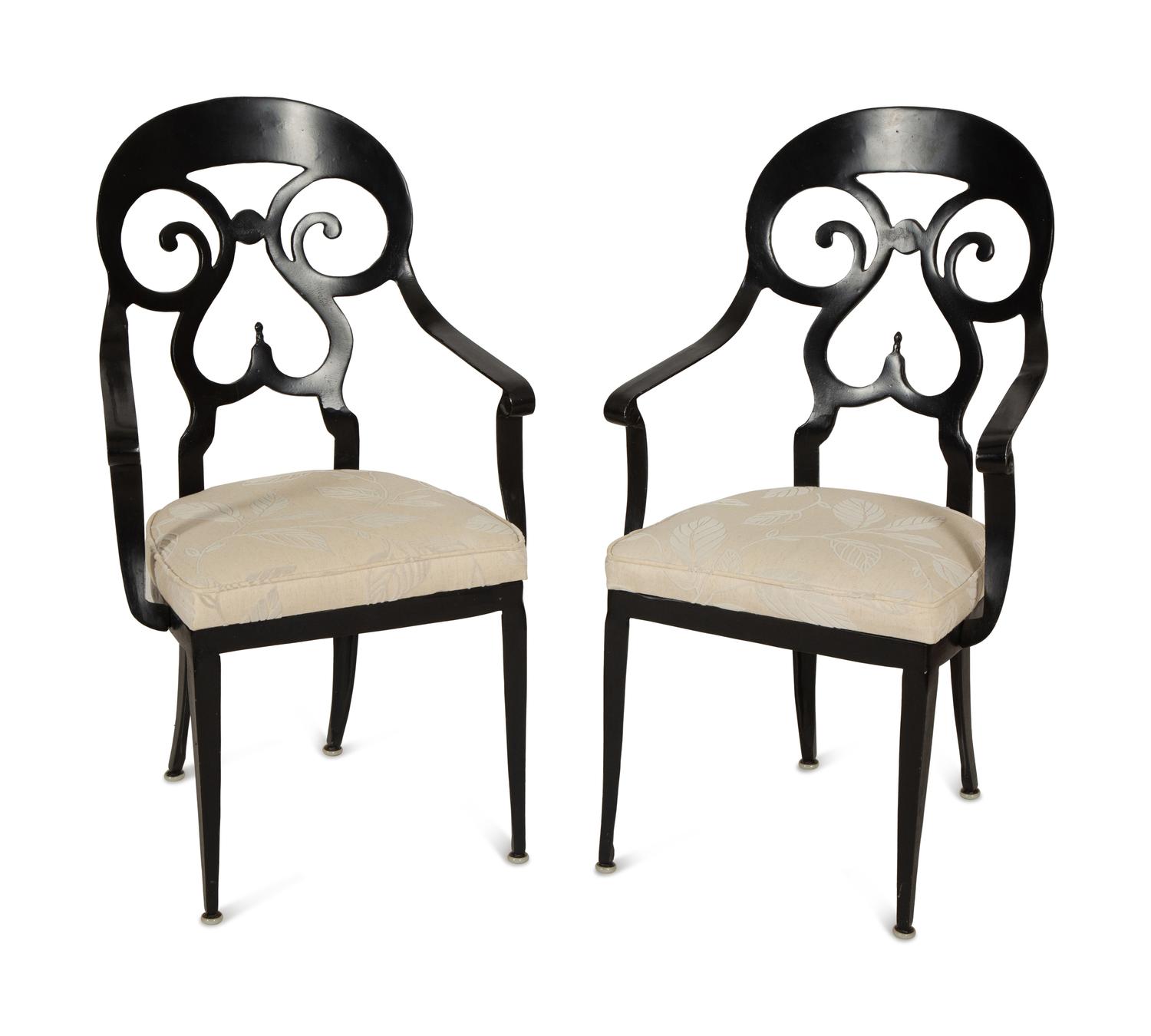 A Pair of Black Painted Metal Armchairs