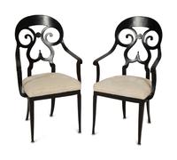 A Pair of Black Painted Metal Armchairs