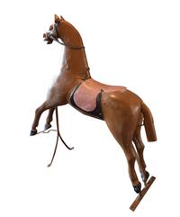 A Carved Wood Carousel Horse 46" W x 16" D x 54.5" H — Argentina, Early 20th Century