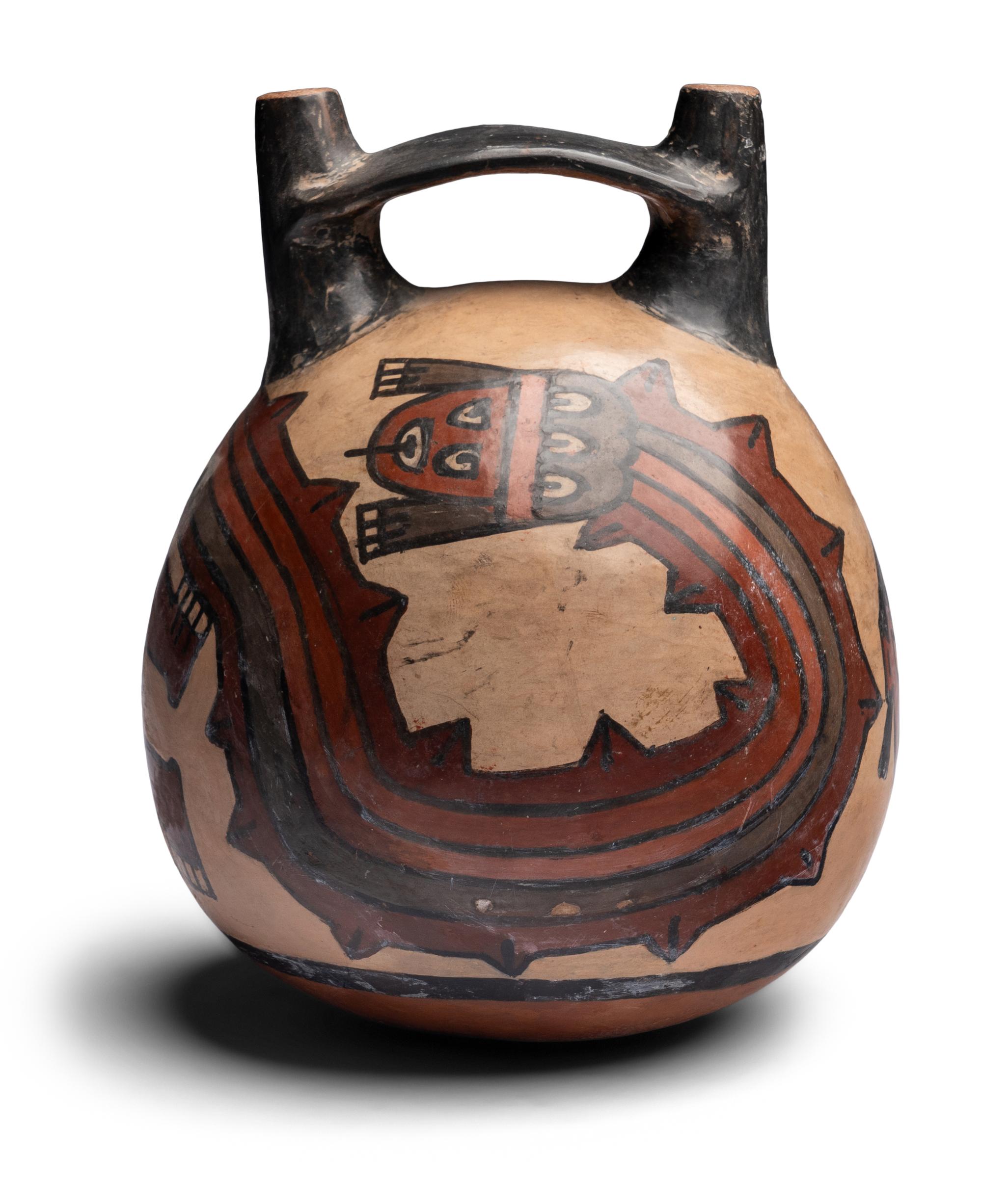 A Nazca Style Polychrome Stirrup Vessel
