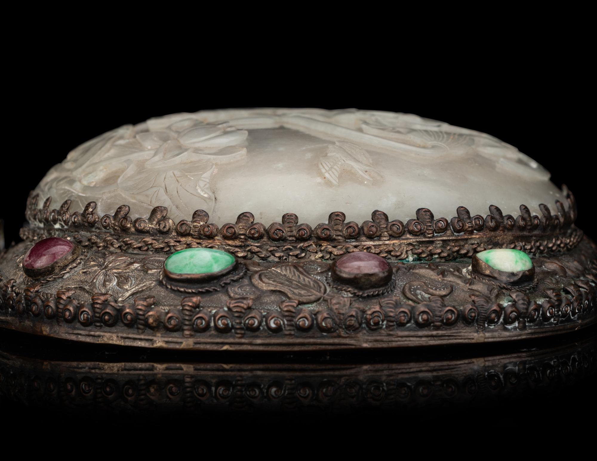 A Chinese Celadon and White Jade-Mounted Silver Hand Mirror