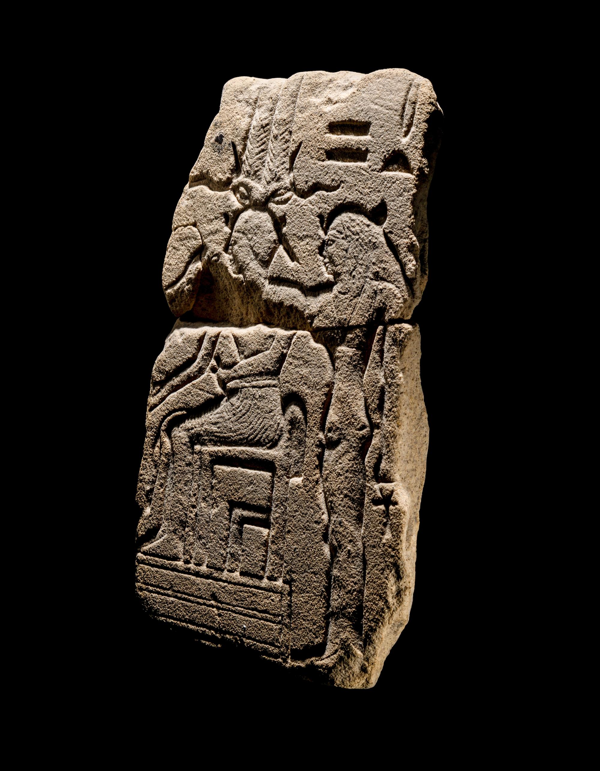 An Egyptian Sandstone Fragment with Osiris and Isis