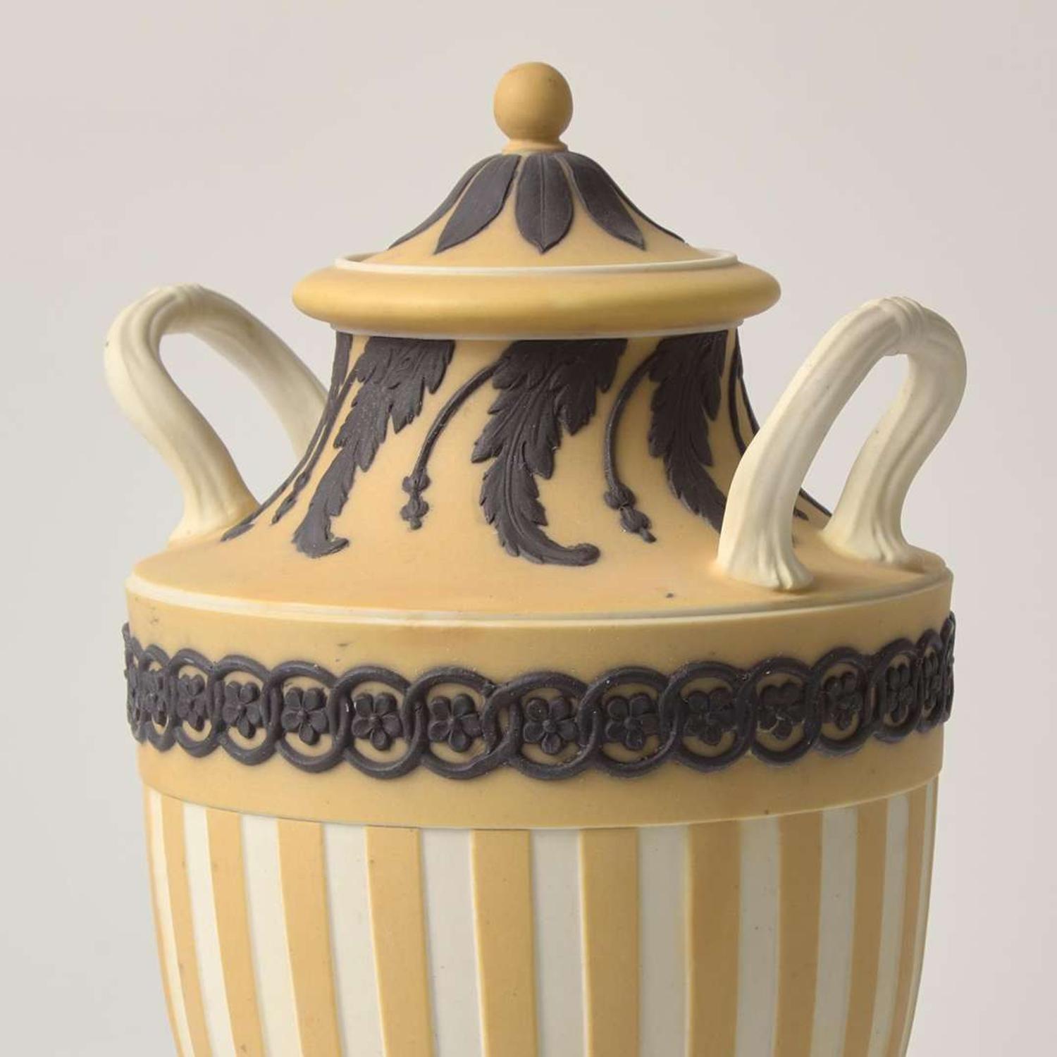A Wedgwood Buff Yellow Dip and Solid Black Jasperware Vase and Cover UK, circa 1880