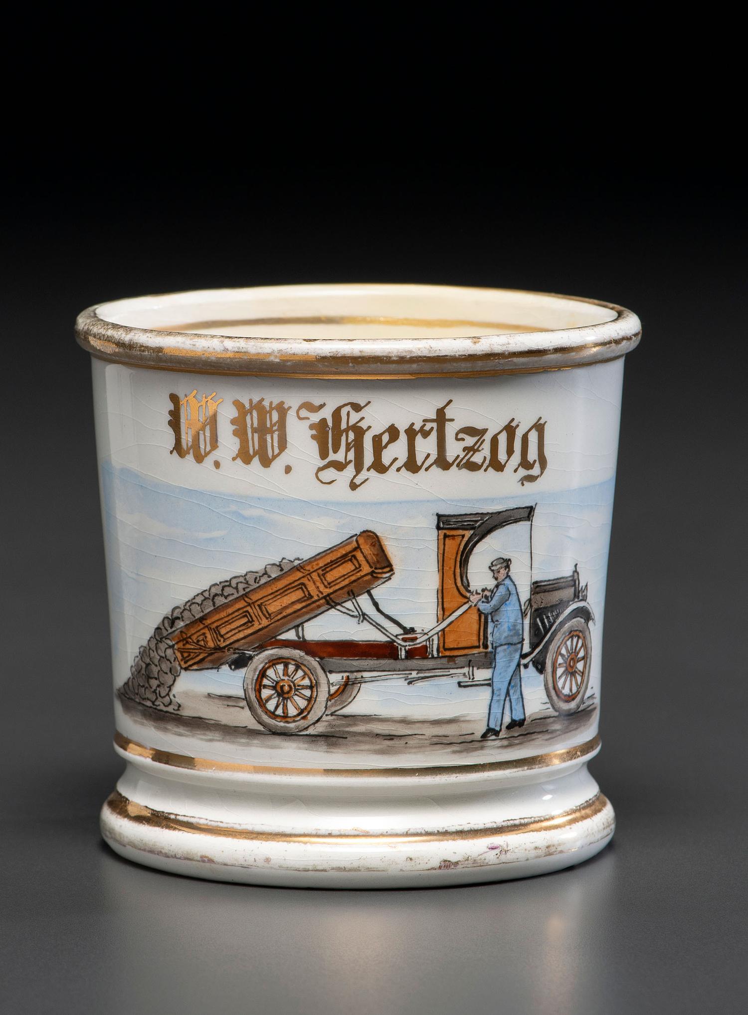 A Porcelain Occupational Shaving Mug Depicting a Dump Truck