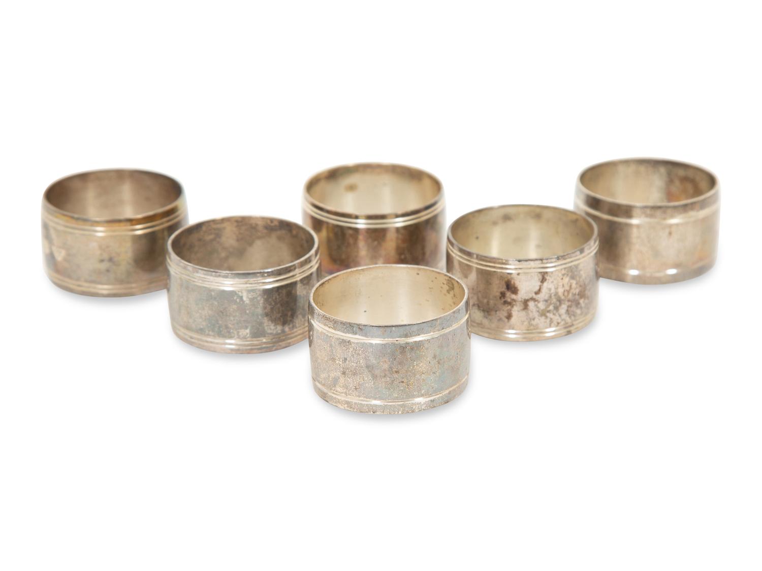 Twenty-two English Silver Napkin Rings by J. A. Campbell, London 1977-2012