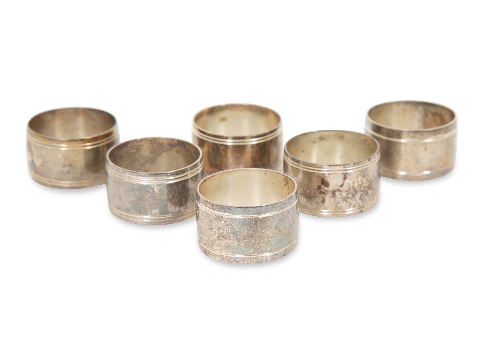 Twenty-two English Silver Napkin Rings by J. A. Campbell, London 1977-2012