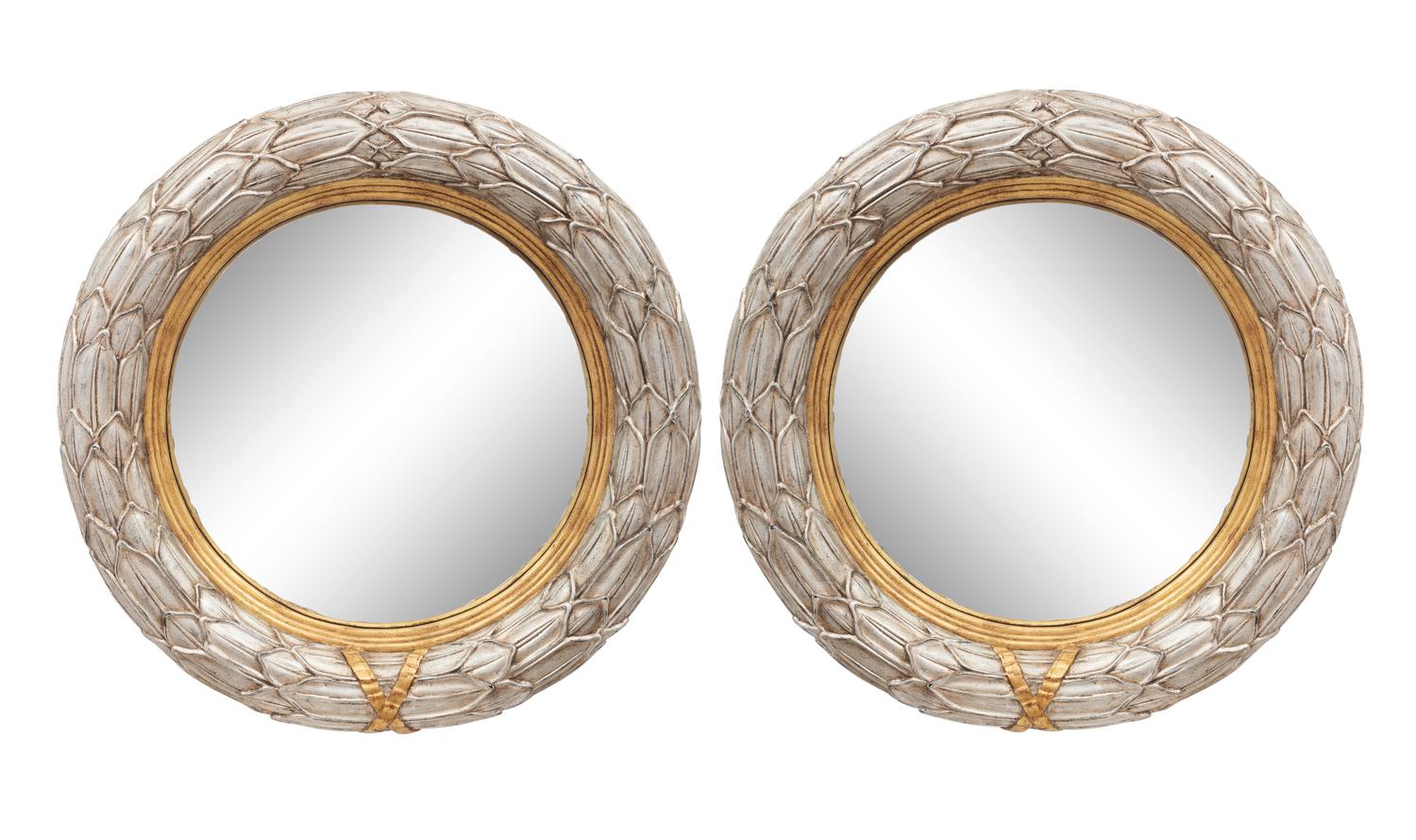 A Pair of Silvered and Parcel Gilt Convex Mirrors