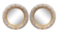 A Pair of Silvered and Parcel Gilt Convex Mirrors