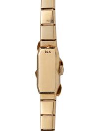 SOLD: 14K YELLOW GOLD AND DIAMOND SURPRISE WRISTWATCH