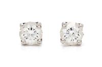 A Pair of Platinum and Diamond 'DB Signature' Stud Earrings, De Beers, 1.35 dwts.