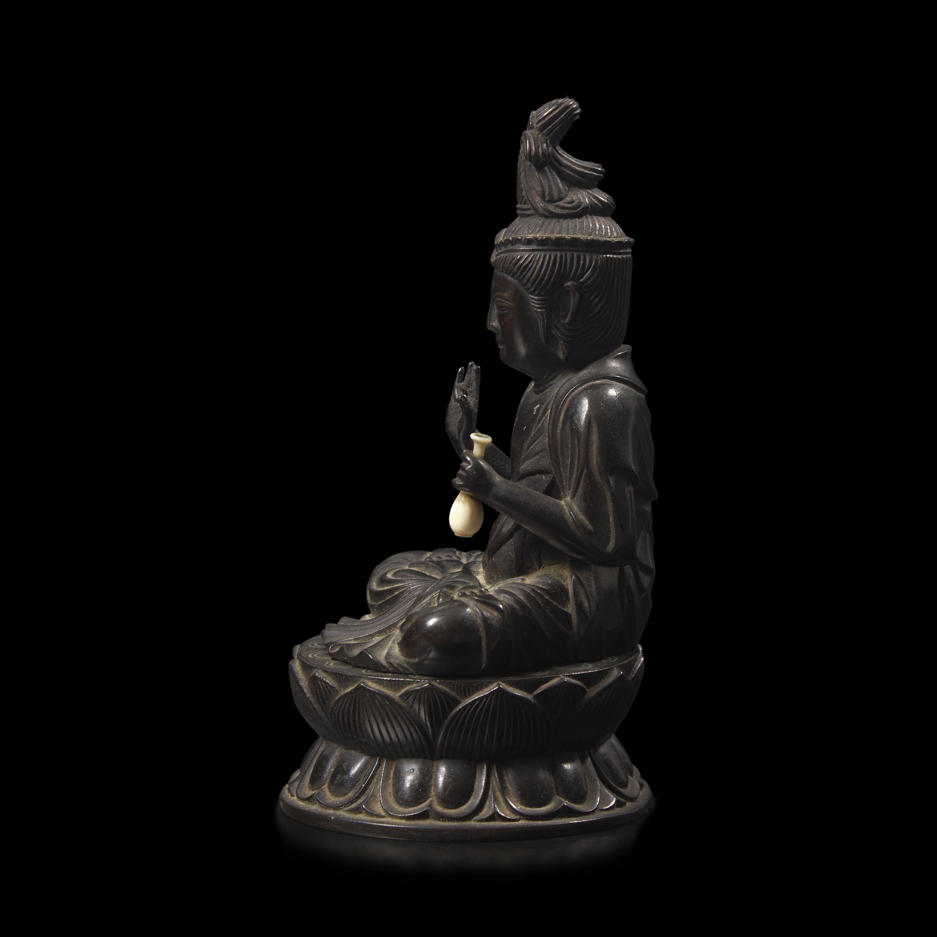 A Japanese Patinated Bronze Seated Bosatsu and Lotus Stand, with Signature of Watanabe Doi, Meiji Period