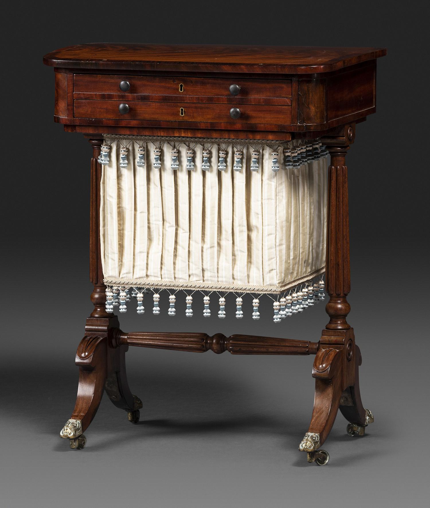 A Classical Figured Mahogany and Rosewood Veneered Sewing Table
