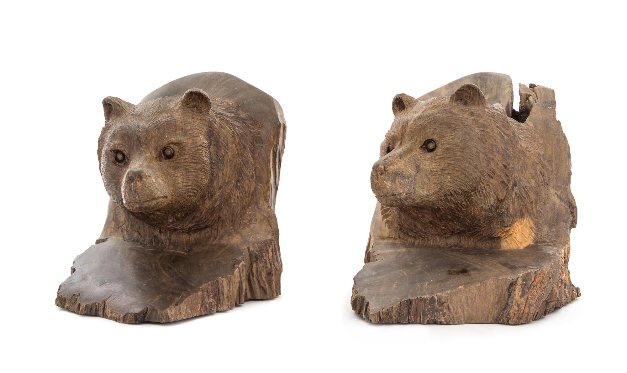 A Pair of Carved Wood Bookends Height 6 3/4 inches.