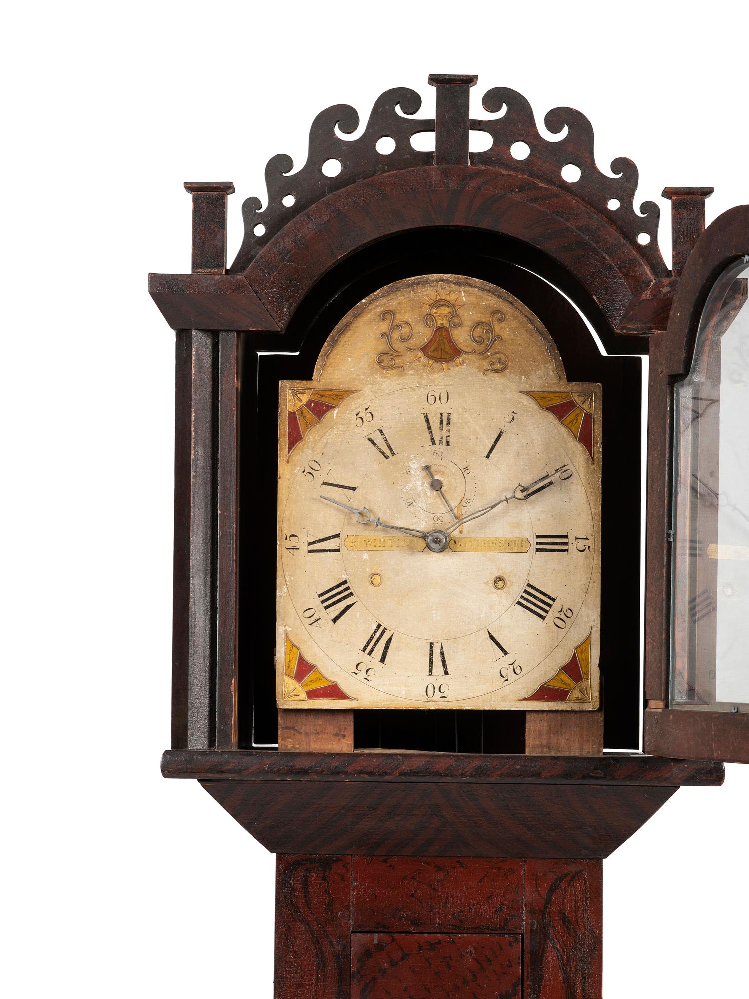 A Federal Carved and Grain Painted Pine Wooden Works Tall Case Clock