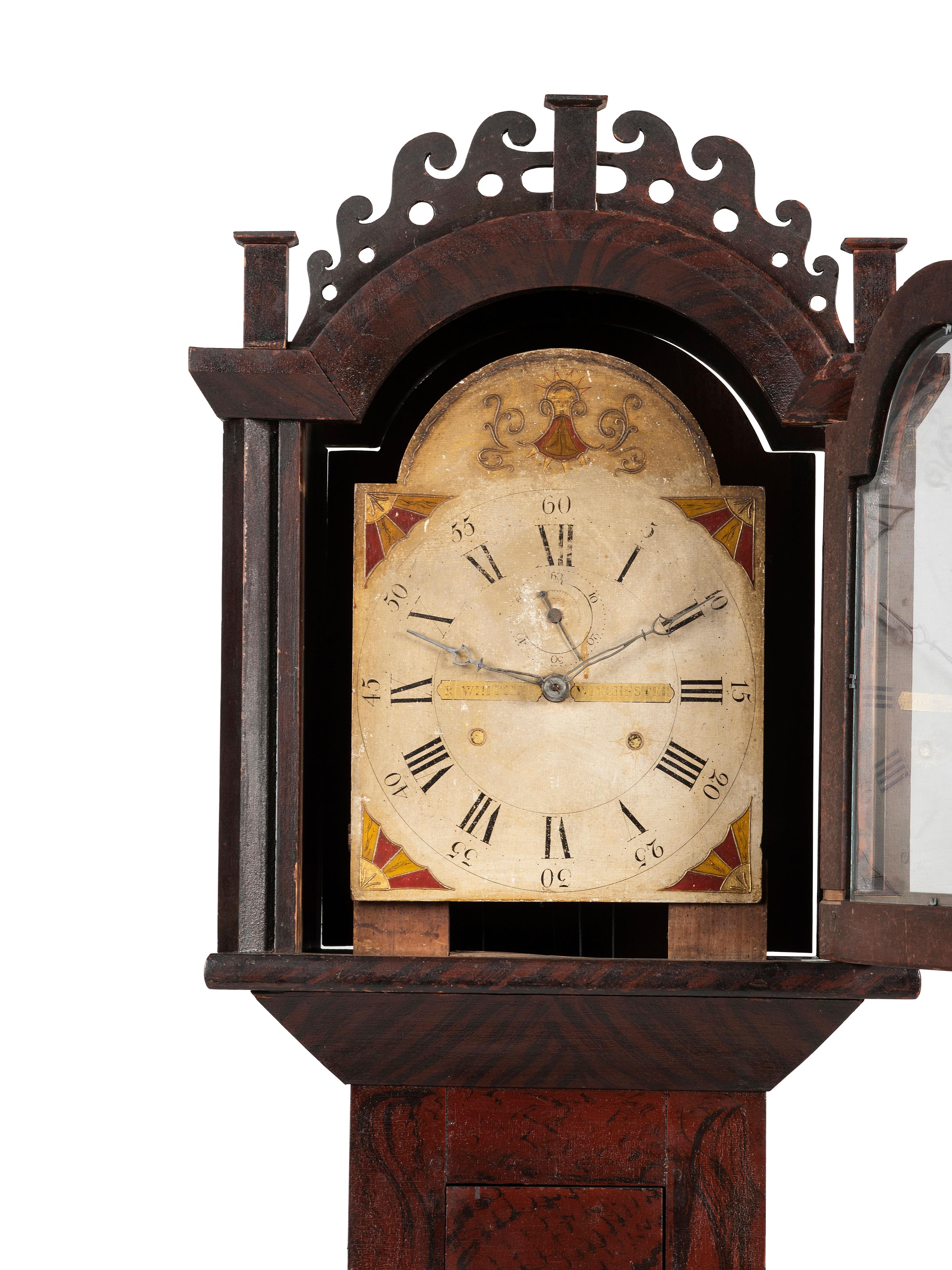 A Federal Carved and Grain Painted Pine Wooden Works Tall Case Clock