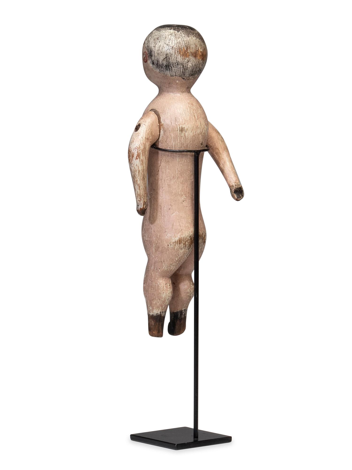 A Carved and Painted Wood Whirligig