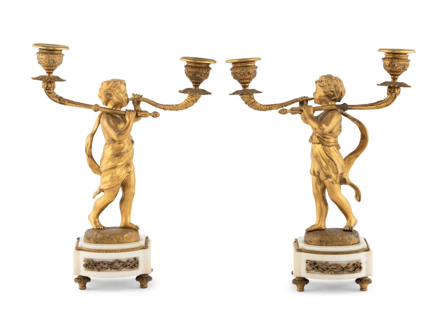 A Pair of French Gilt Bronze Figural Two-Light Candelabra