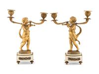 A Pair of French Gilt Bronze Figural Two-Light Candelabra