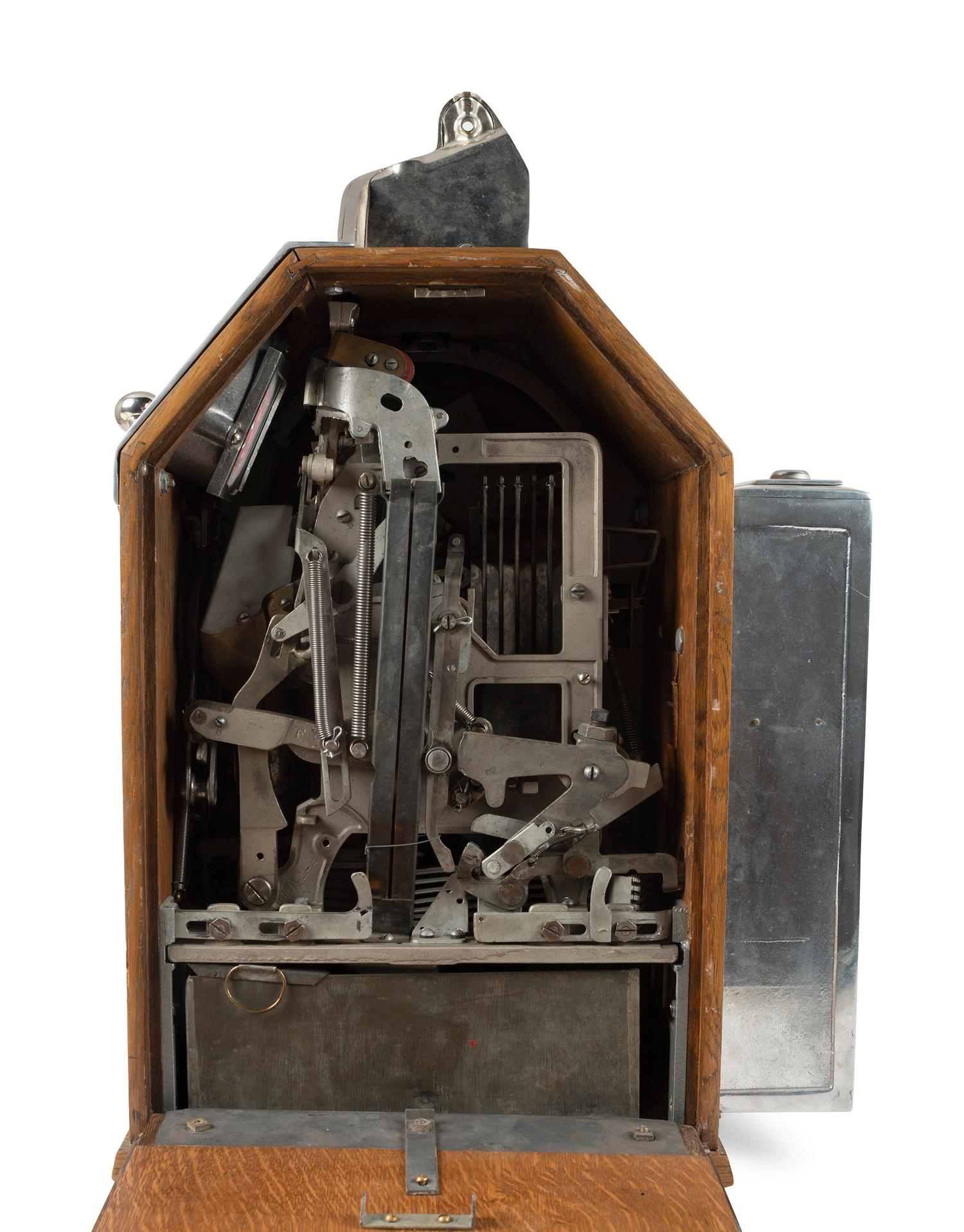 A Jennings One Cent Little Duke Gum Dispensing Slot Machine