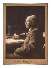 [HARDY, Thomas (1840-1928)]. EDIS, Olive, photographer. Portrait photograph of Thomas Hardy signed ("Thomas Hardy"). Norfolk & Farnham, Surrey: Studios at Sheringham & Cromer, 1913.