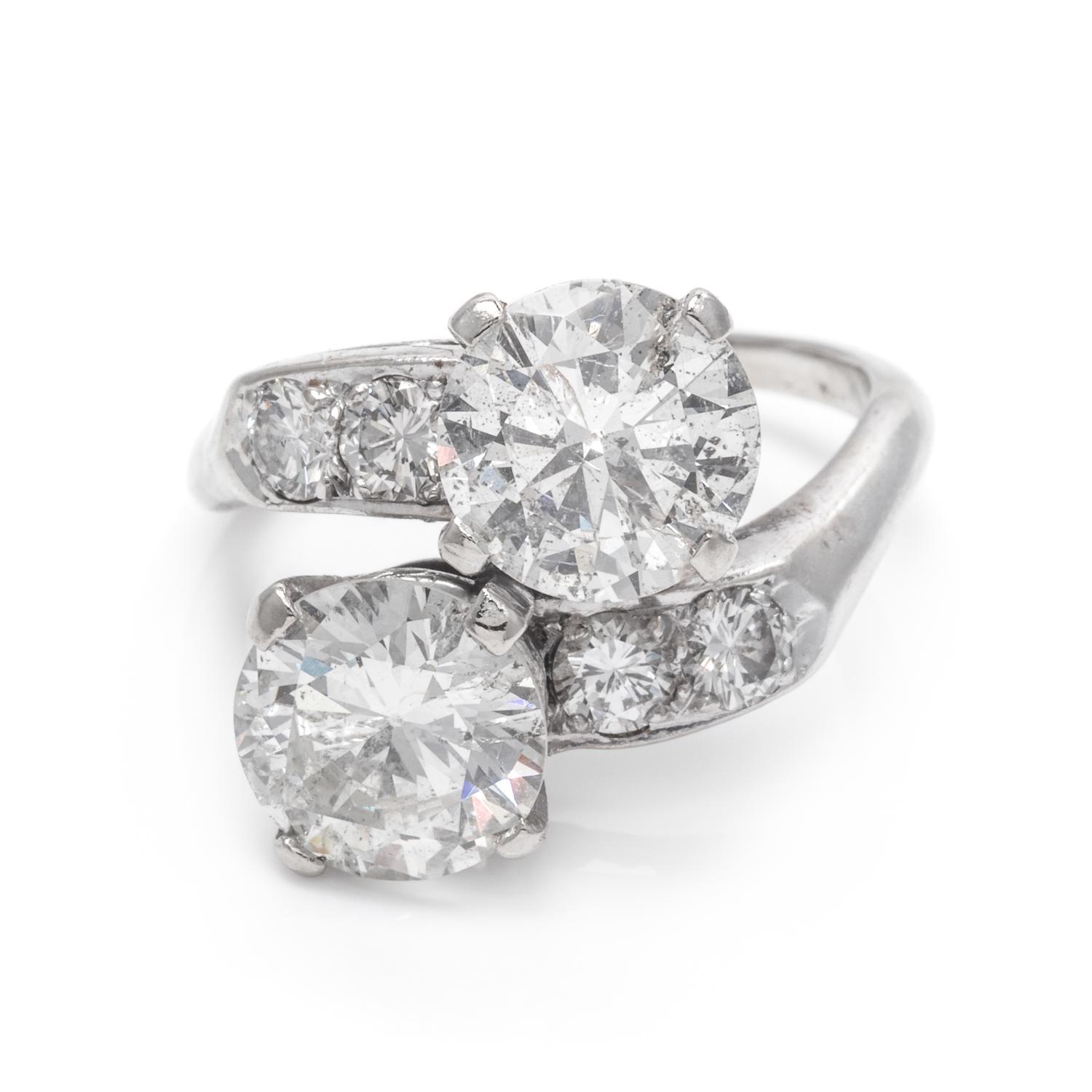 A 14 Karat White Gold and Diamond Toi et Moi Ring,
