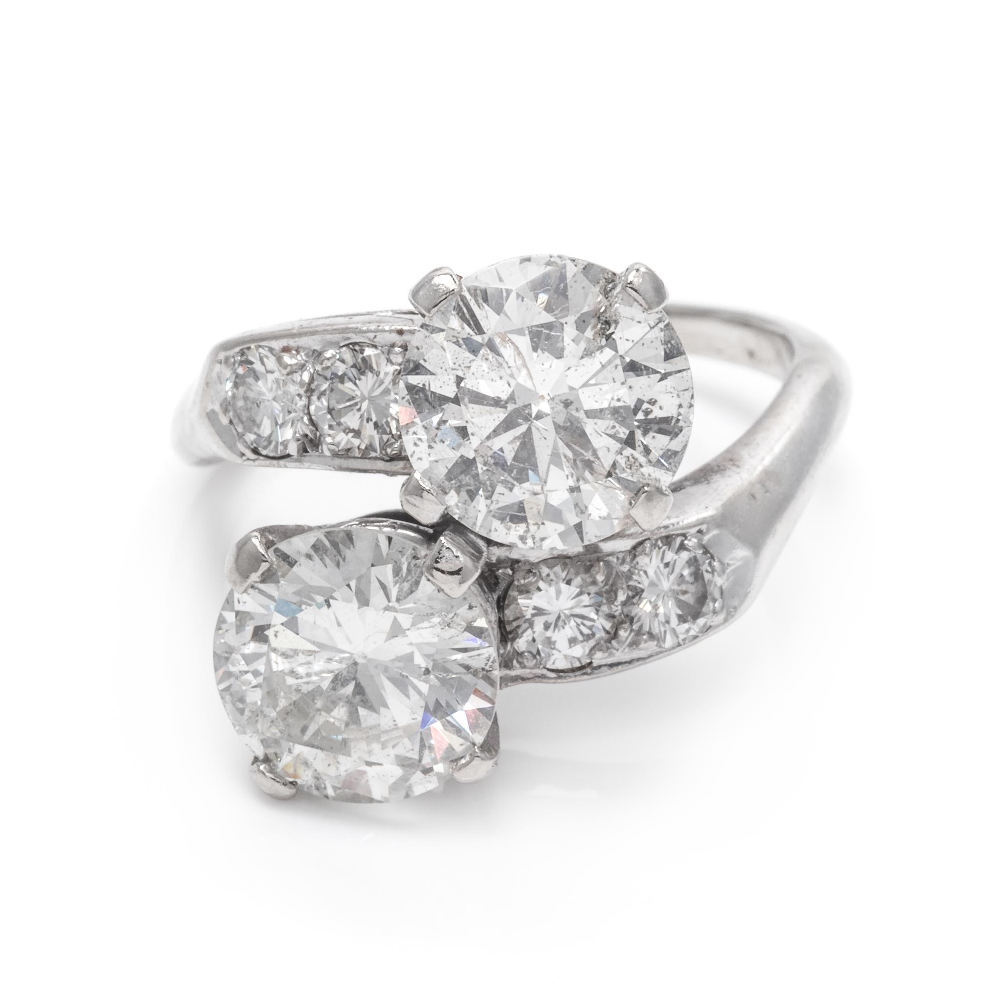 A 14 Karat White Gold and Diamond Toi et Moi Ring,