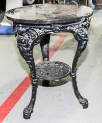 A Victorian Style Wrought Iron Marble Center Table Height 27 x diameter 22 inches. — 20TH CENTURY