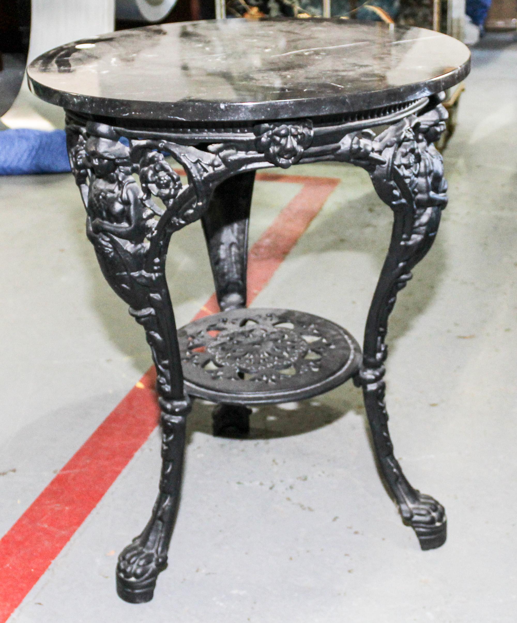 A Victorian Style Wrought Iron Marble Center Table Height 27 x diameter 22 inches. — 20TH CENTURY