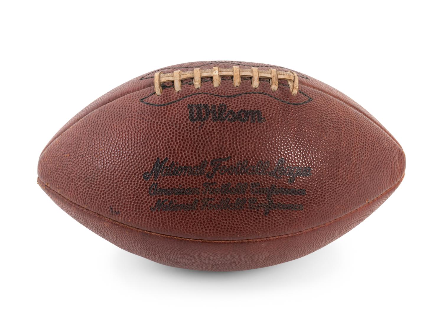 A Group of Three Signed Football Items Including Derrick Thomas and Lawrence Taylor