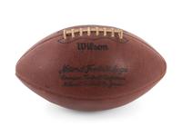 A Group of Three Signed Football Items Including Derrick Thomas and Lawrence Taylor