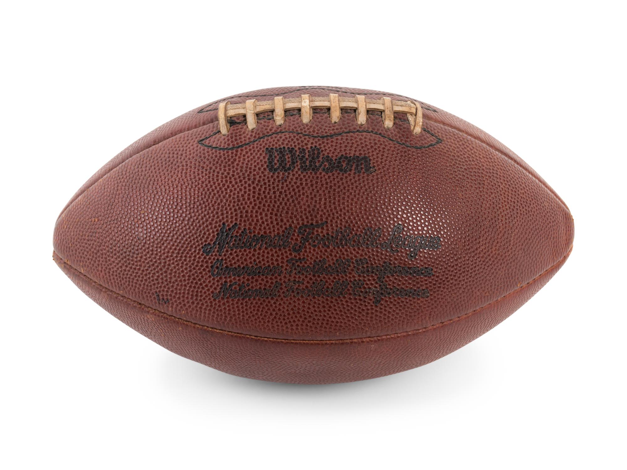 A Group of Three Signed Football Items Including Derrick Thomas and Lawrence Taylor
