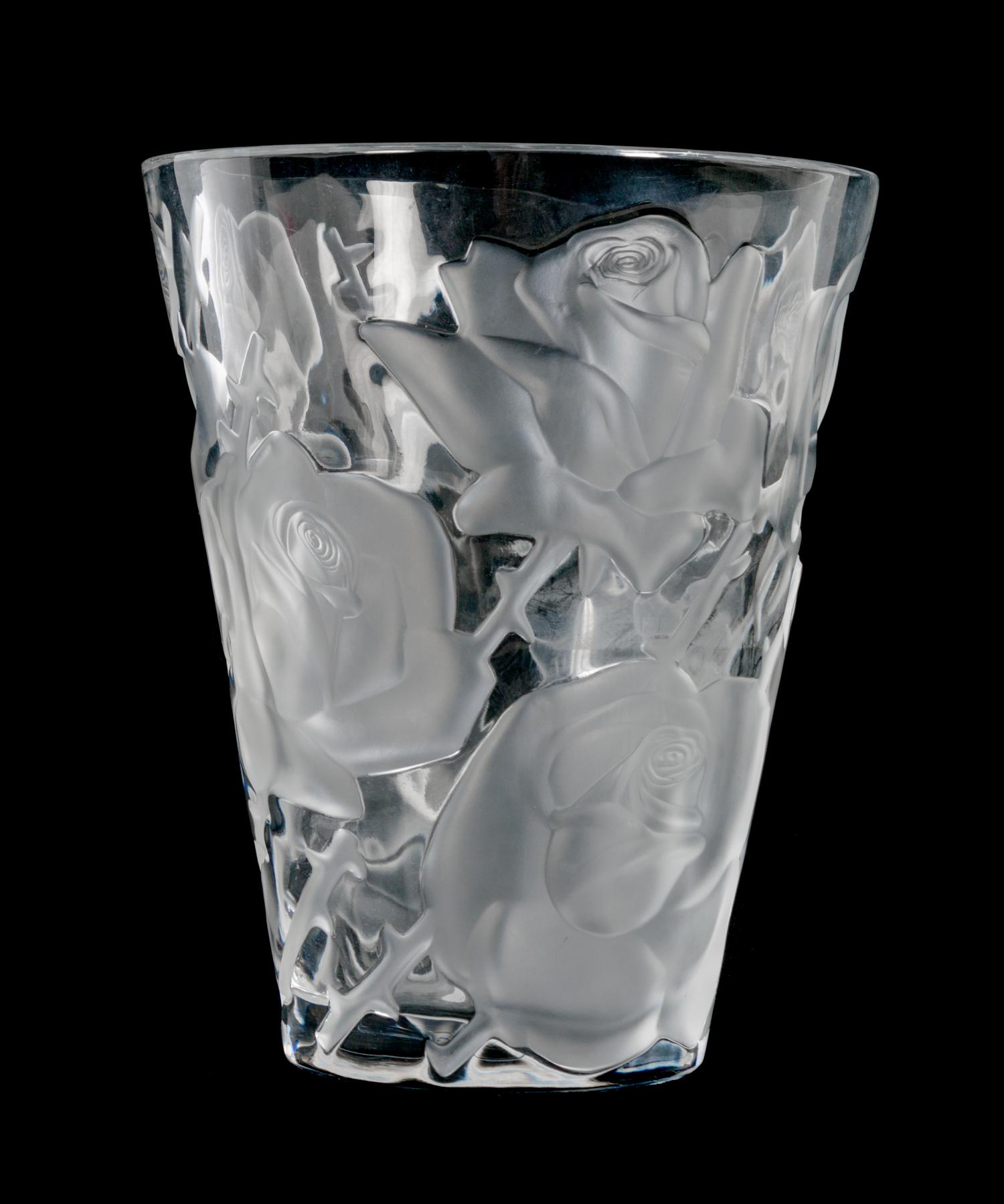 A Lalique Molded and Frosted Glass Vase Height 9 1/2 x diameter 8 inches.