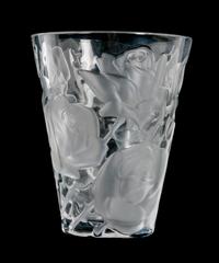 A Lalique Molded and Frosted Glass Vase Height 9 1/2 x diameter 8 inches.