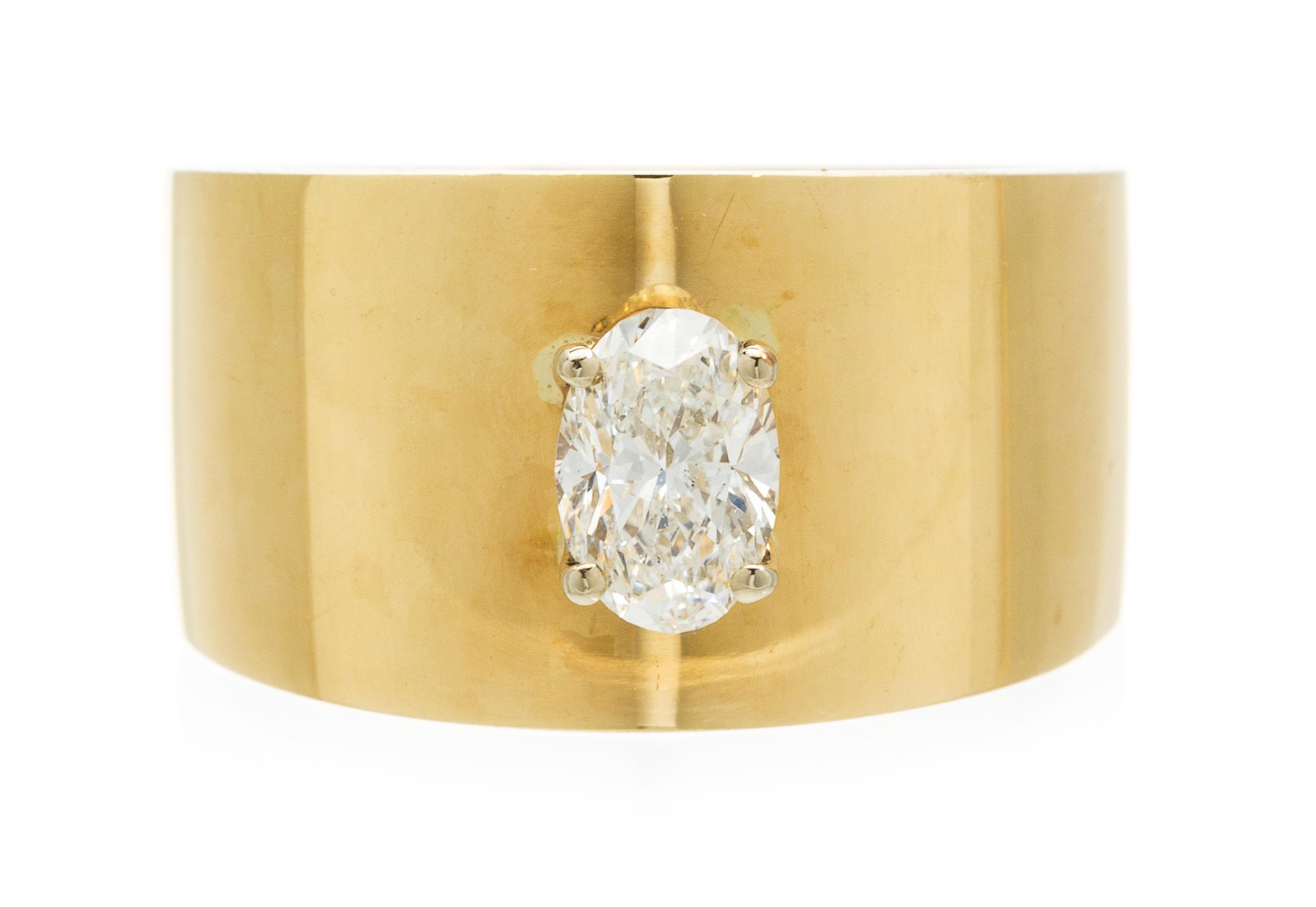 A 14 Karat Yellow Gold and Diamond Solitaire Ring, Midas, 6.20 dwts.