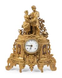 A Louis Philippe Gilt-Metal Figural Mantel Clock — MID-19TH CENTURY