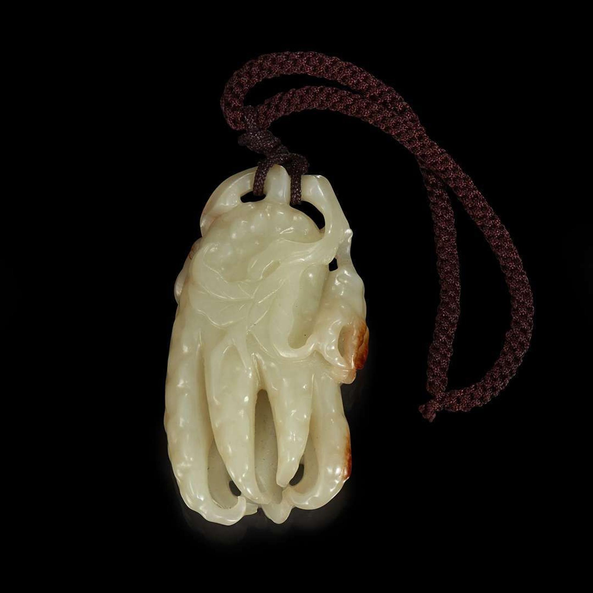A Chinese white jade "Buddha's hand" citron pendant 白玉佛手
