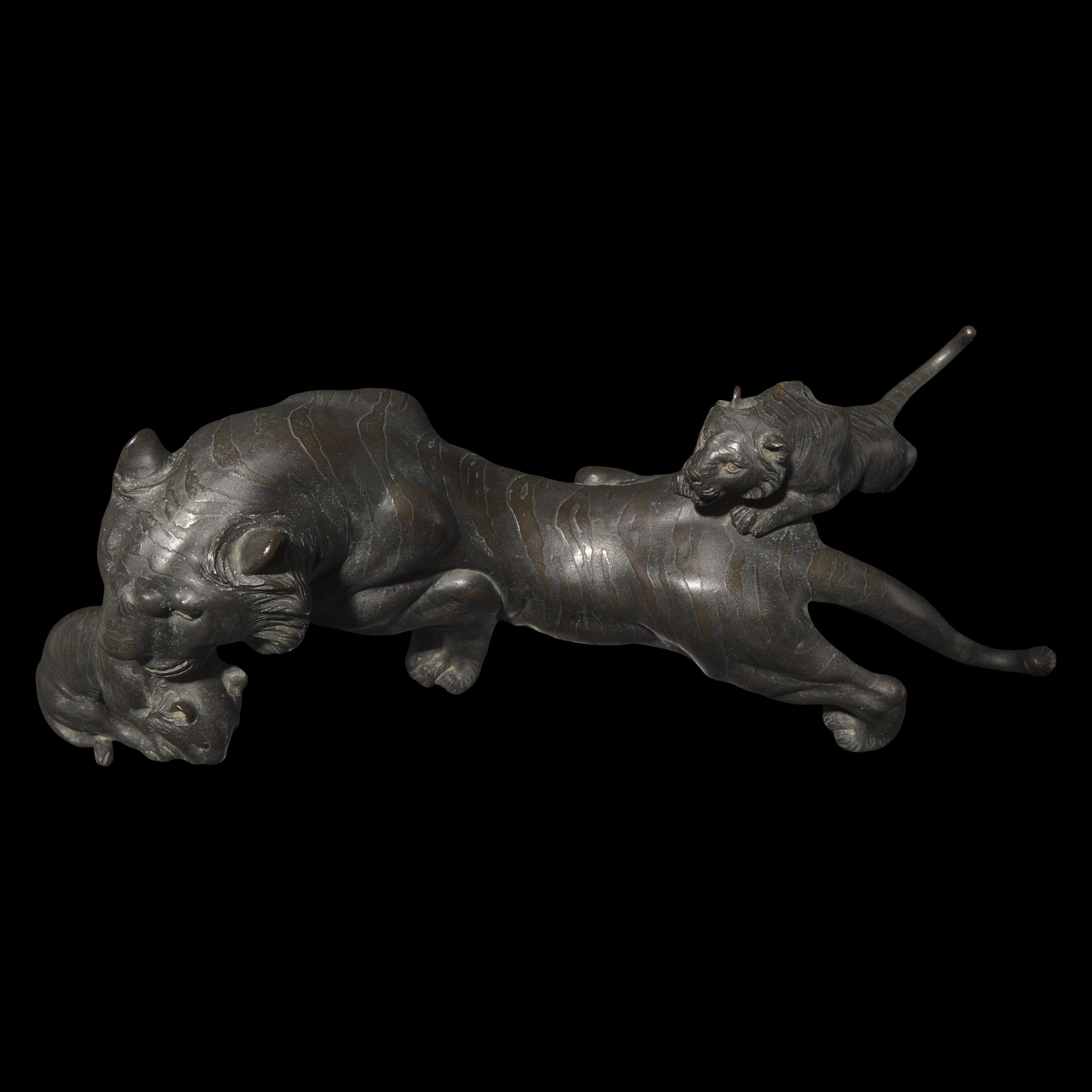 A Japanese Patinated Bronze 'Tigress and Cubs' Okimono, Meiji/Taisho Period