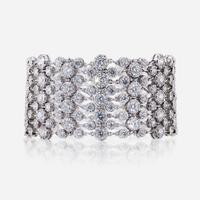 An eighteen karat white gold and diamond bracelet