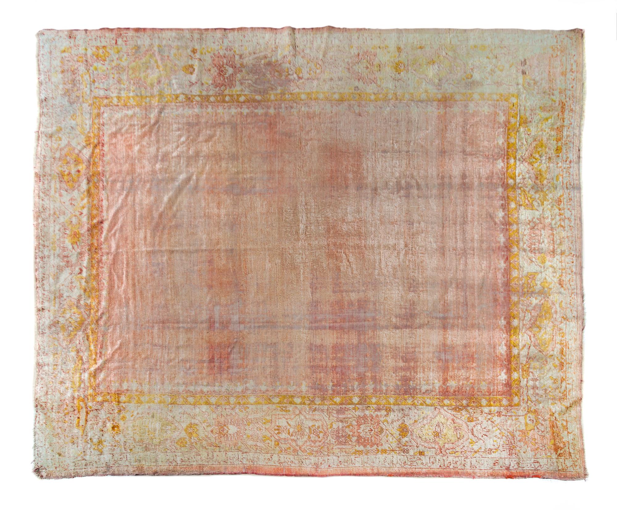 An Oushak Wool Rug 12 feet 2 inches x 10 feet 6 inches. — EARLY 20TH CENTURY