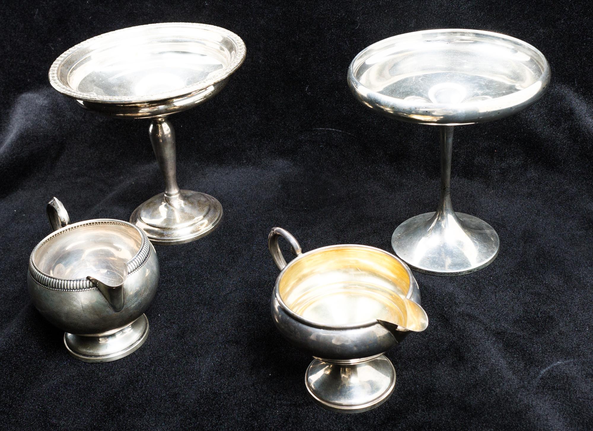 A Collection of Weighted Silver Table Articles, various makers, comprising candlesticks, tazze, creamers, vases, casters and bowls.